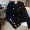 Giacche da donna Design retrò nera Giacca in lana a collo rotondo per abbottonatura elegante e lussuosa a maniche lunghe