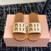 Najwyższej jakości Lympia Slides Slipper Womens Raffia Tloave Logo Logo Flat Sandals Buty plażowe luksusowe slajdy dla damskich buty wakacyjne 35-42 z pudełkiem