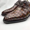 Chaussures habillées chue arrive les hommes de cuir crocodile de leahter nombril