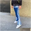 Jeans pour hommes de couleur haute couleurs épissées lavées surdimensionnées larges de jambe droite pantalon flare rétro pantalon décontracté.