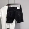 Jeans masculinos 2024 Calças de verão em estilo coreano jeans da moda angustiada perna reta elegante shorts de joelho preto para homens