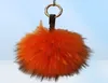 Keychains y echter Pelzballschlüsselkette Puffhandwerk DIY Pompom Black Pom Keyring UK Charme Frauen Bag Accessoires Geschenk6251236