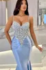 Sexy arabisch blau rosa spaghetti gurte mermaid abendkleider perlenkristalle top ruflen satin long party kleider kleider