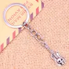 Keychains 20pcs Fashion Keychain 32x11mm Guitar Skull Pendants DIY Men Jewelry Car Key Chain Ring Holder Souvenir For Gift