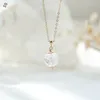 Colliers pendants Luxury Luxury 45 cm Longueur de chaîne Naturel Perles de cristal de fraise naturelle O Forme du cou collier de cou en métal pour vêtement