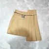 Skirts designer Nanyou Zhi 2024 Early Spring New Fashionable Irregular Pleated Half Skirt Classic Slimming Metal Belt Short ON4U