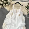 Casual klänningar Foamlina Beach Vacation Dress for Women Fashion Spring French Bubble Sleeves Hollowed Out Backless White