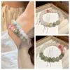 Bracelet à charme jade coloré chinois pour dames coréennes Fashion coréenne Gift de poignet de corde élastique à la main
