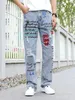 MENS Y2K JEANS LADGY JEANS HIP Hop pantaloni strappati cartone animato graffiti sciolti stampa di pantaloni casual cargo per uomini 240415