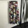 Ensembles de robes à deux pièces à imprimé floral pour femmes de la piste de mode Slash Col Top et longues combinaisons de vitesses