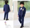 Anzüge Kinder Jacke Weste Hosen Bowtie Blume 5pcs Zeremonie Tuxedo Kleider Jungen Hochzeit Anzug Teen Kinder Foto Performance Kostüm