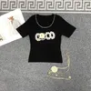 Designer de t-shirts pour femmes Xiaoxiangfeng 23 Été Nouveau Dingdiamond Collar Coco Letter Fashion Slim Fit Tricoted Femme à manches courtes 19ce 19ce