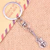 Keychains 20pcs Fashion Keychain 32x11mm Guitar Skull Pendants DIY Men Jewelry Car Key Chain Ring Holder Souvenir For Gift