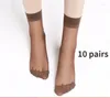 Chaussettes féminines 2024 10 paires de la peau d'été couleur transparente transparent mince cristal nylon dames femelle courte cheville