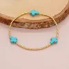 Bracelets de liaison petite conception d'origine cross frontière européenne et américaine de style ethnique Copper perles turquoise couple bracelet entier