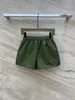 Kvinnors shorts designer nanyou zhi 24 tidigt vår ny mode triangel bokstav avslappnad byxor klassisk elastisk midja nylon vik mångsidig 02da