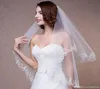 Nouveau bon marché en stock Longueur du coude 2 couches Veille nuptiale avec applique en dentelle Veaux de mariage ivoire pour les événements de mariage en ligne9889830