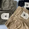 Pantalon masculin pour hommes pantalons de chargement d'inspiration rétro en plein air avec un tissu résistant à la conception de conception de plusieurs poches pour