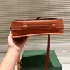 Frau Herren Sattel Umhängetaschen Designer -Tasche Crossbody -Telefontaschen kleine Sattel Kreuzkörperabdruck Buchstaben Leder 10a