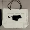 Shoulder Bags 2023 New Alphabet Printed Canvas Bag Womens Large Capacity Shoulder Bag Trendy Chain Shopping Bag Small Fragrance Bag T240416