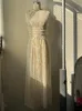 Elegante abito a pieghe per cavi Donne allacciate a corto short Shold Top set Fashion Film Female Long Long Set da 2 pezzi 240403