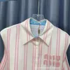 24 anni all'inizio della primavera Nuovo design di nicchia Stripe dolci a contrasto a contrasto coreano Top coreano