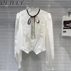 Chemise courte des chemisiers pour femmes pour les femmes 2024 Spring French Lace Flounce Bow Tops Tops à manches longues décoratives à paillettes