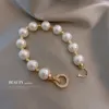 Ссылка браслетов Корея Жемчужная короткая пряжка Высококачественная элегантная леди ежедневная сплава браслеты