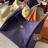 Kadın Çanta Gezimi Çantası Perakende Toptan Tasarımcı% 95 KAPALI Çantalar Tote 2024 Banliyö Aynı Crossbody Büyük Stil Naylon Kapasite Faye One Omuz Postacı RC6C