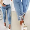 Jeans pour femmes slim fit longues jambes papillon collant fleur collante perles pantalon crayon denim divisé pied femme haute taille