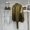 Camicette da donna 2024 camicia d'oro primaverile per donna con cassa di cassa in pizzo imbracatura bronzante camicetta a maniche lunghe sciolte a due pezzi