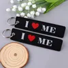 Chaveiros eu amo emo meninos bordados key fobs cita tags vermelhas coração para mulheres acessórios de chaveiro de garagem pingente de backpack de presente