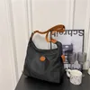 Baobao Handbag حقيبة التخليص قبالة البيع بالتجزئة وزلابية الجملة 95 ٪ 2024 جديدة للبذور البسيطة هوبو المووبس الأم مقاوم للماء أكياس الكتف الكتف LVPL