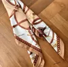 This mulberry silk scarf is exquisitely adorned with G-shaped buckle, stirrups, and chain prints, showcasing G's design inspiration drawn from the equestrian world.90cm