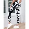 Kvinnors leggings tryckt yoga hög midja fashionabla löpande slipsfärgade fitnessövning