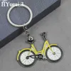 Keychains Lanyards Creative Bicycle Pendant Pendre Keychain Style Metal Bike Key Anneau Men Men Purse Decor Decord Cadeaux d'anniversaire D240417
