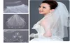 Bridal Veils 2 Layers Embroidery Pearl Elbow Length Formal Veil Cheapest Long Veu De Noiva Longo Purfle with Comb For Wedding Veil6012251