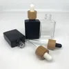 Storage Bottles 5Pcs 30ml Rectangle Essential Oil Bottle Bamboo Lid Customize Frosted Black Cosmetic Glass Dropper For Colognes Tincture