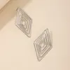 Boucles d'oreilles Stud Huanzhi Design de mode exagéré grand pour les femmes Geometric Square Hollow Retro Jewelry Gifts Wholesale 2024