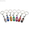 Keychains Lanyards Eindeutige Mini -Auto -Turbo NOS Schlüsselbund Stickstoffflasche Metall -Schlüssel Ring Pill Box Speicher Stilvoller Auto Motorrad Innenraum D240417
