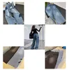 Lila varumärke jeans designer lösa brett ben byxor avslappnade kvinnor långa knappar sommarhål hög gata lila retro tvättade gamla jeans lång bokstaven broderi