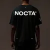 Nocta Designer Tide T Shirts Nocta Letterラミネートプリントショートスリーブハイストリートルーズ特大のカジュアルスポーツTシャツ100％ピュアコットントップ