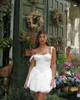 Élégants femmes en dentelle d'été Patchwork corset mini robe robe sans manches carrés noue nouep court aline flowy fête 240410