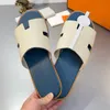 مصمم رجال أوران Slippers جلد صندل 2024 New Fashion Slippers Izmir Flip Flop Heritage Calfskin Sandals for Mens Summer Summer Lazy Beach Casual Slides