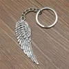Keychains Lanyards Hot Sale New Angel Wing Keychain Car Keychain Wing Pendants Key Chain For Car Metal Pendant Bag Cute Charm Handmade Gifts d240417