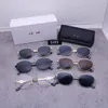 Dames designer zonnebril UV -bescherming mode zonnebril letter casual retro -bril metalen spiegelpoten ovale frame glazen voor man met doos