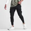 Pantalon masculin Solide Solid Fitness Running Pockets Long Plant Sport Sport Jogger pantalon pour les hommes Breathable