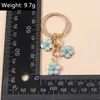 Keychains Lanyards Cute Enamel Keychain Colorful Sakura Flower Key Ring Sweet Key Chains for Women Girls Handbag Accessories DIY Jewelry Gifts d240417