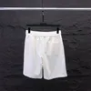 Shorts pour hommes de créateurs de scénois de plage d'été coton plaid coton pantalon à cordon imprimé détendu Homme streetwear décontracté