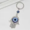 Keychains Lanyards Lucky Eye Fatima Hamsa Hand Nyckelring Turkish Evil Eye Key Chain Bag bil Keyring för kvinnor Män Llavero Porte Cl D240417